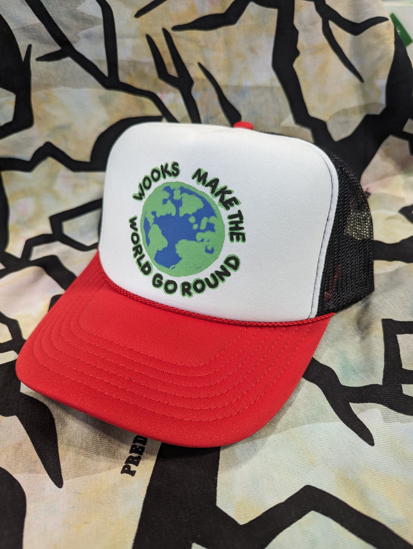 Wooks Make The World Go Round Trucker Hat